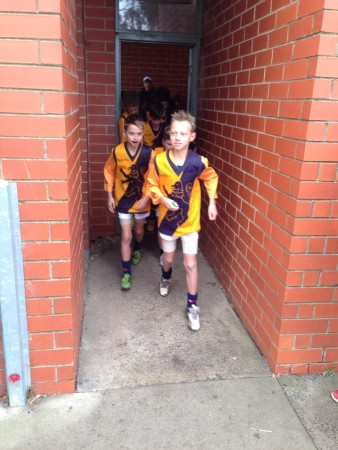 Lachlan Baker-West and Cruize Hollingdale (Captains for the Day) lead Strathmore 2 out to play Keilor